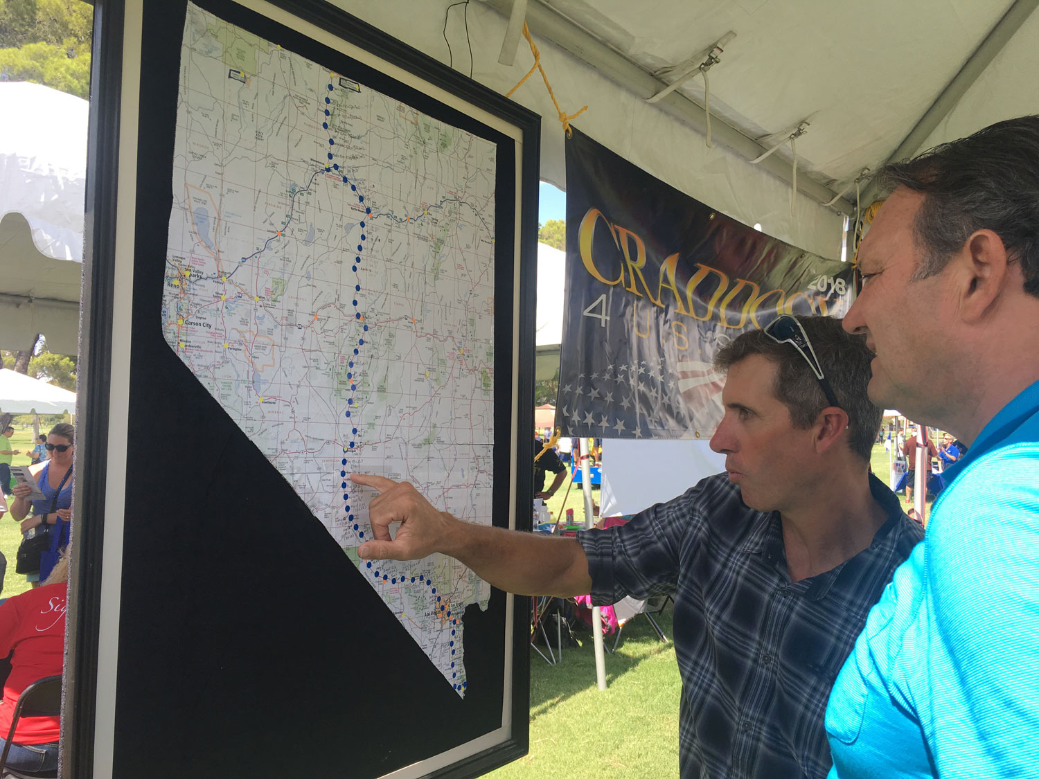 Jared looks at map of Nevada with Jay Craddock