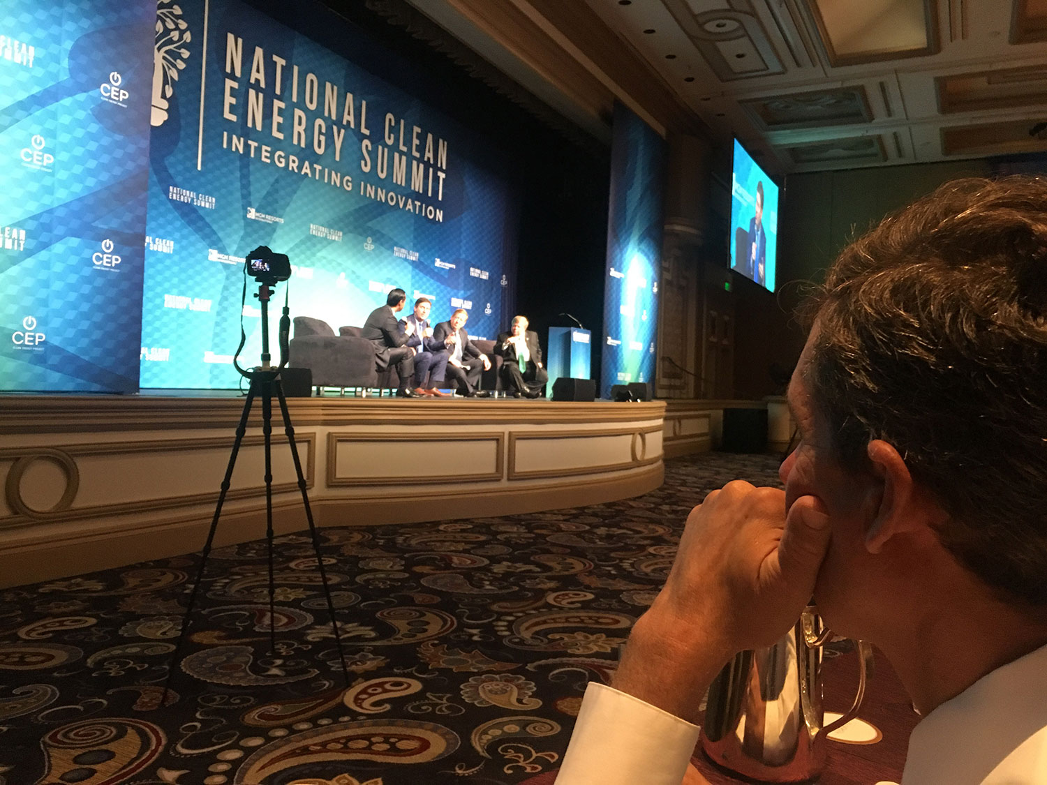 Jared listening to speakers at the Clean Energy Summit