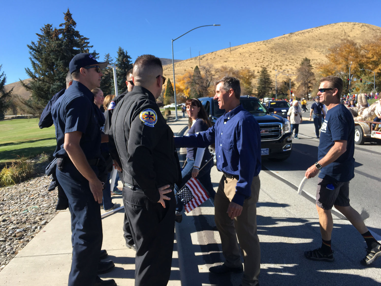 Jared speaking with law enforcement at Nevada Day Parade
