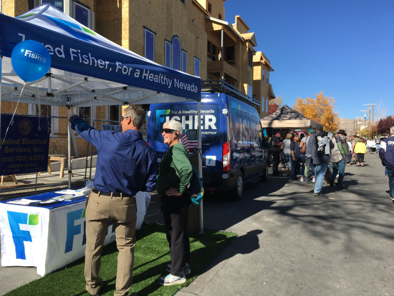 Jared, speaking with a Nevada resident at the Fisher for Nevada Booth in Carson City