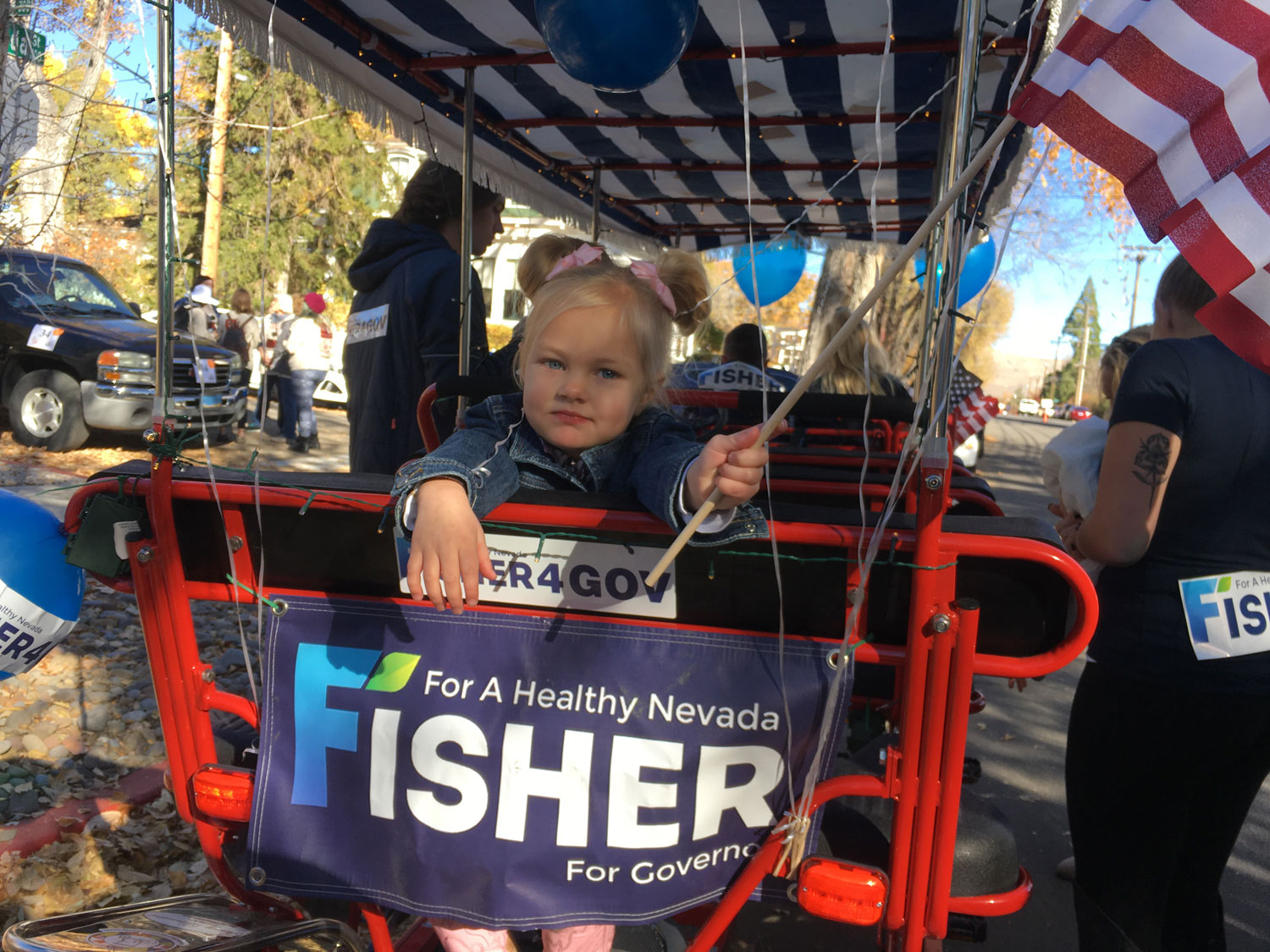 Girl riding on Fisher for Nevada parade float in Carson City